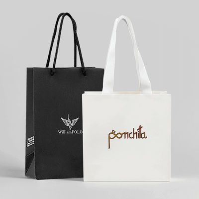 カスタマイズされた折りたたむリサイクル紙 ギフトバッグ ブティック紙バッグ ハンドル付き