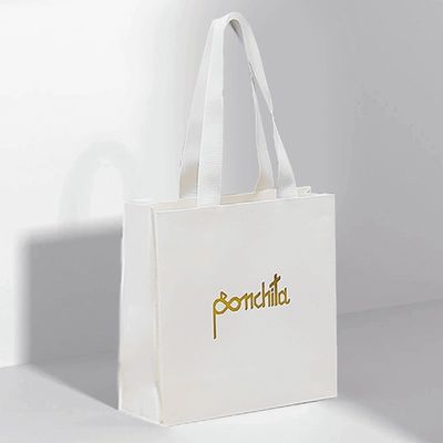 カスタマイズされた折りたたむリサイクル紙 ギフトバッグ ブティック紙バッグ ハンドル付き