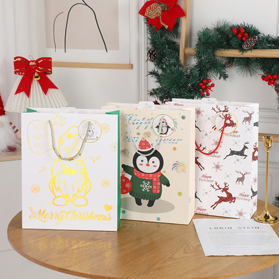 環境に優しいグリーン リサイクルされたクリスマス紙袋 持続可能なクリスマスプレゼントパッケージングソリューション