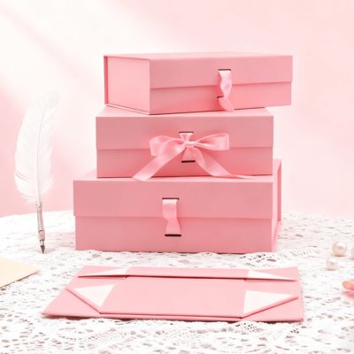 カスタムロゴ品質リボン折りたたみボックス ピンク ブラック 長方形 マグネットアート紙包装 マットラミネートエンボス加工用
